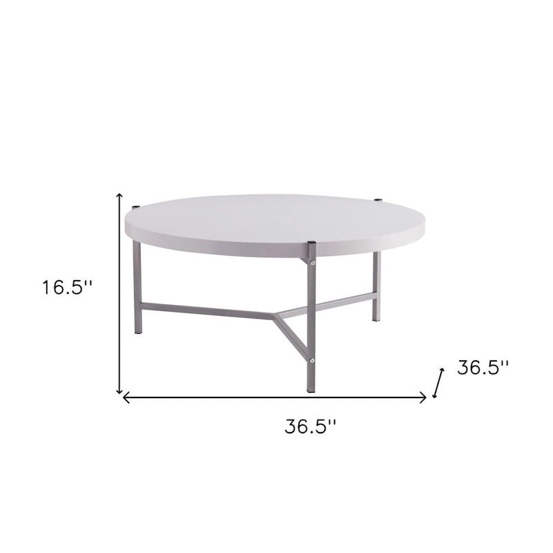 Table basse ronde avec plateau en bois et piètement à 3 pieds en acier inoxydable