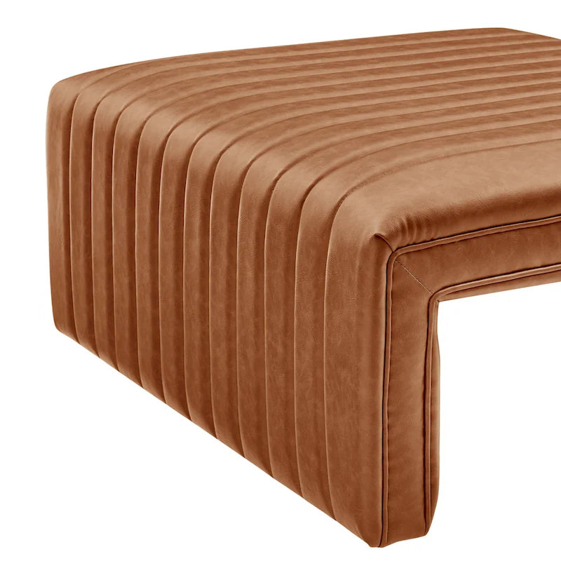 Table basse fer à cheval avec capitonnage cannelé